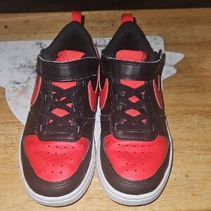 Nike Black and Red Sneakers with Classic Silhouette